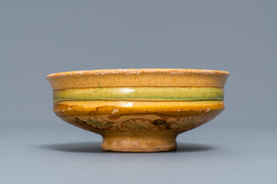 An Italian earthenware sgraffiato tazza with woman's portrait, prob. Ferrara, 15/16th C.