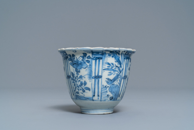 Two small Chinese blue and white plates and a crow cup, Kangxi and Wanli