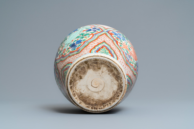 A Chinese wucai vase with fish, Transitional period