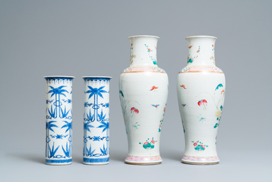 A pair of Chinese famille rose and a pair of blue and white vases, 19th C.