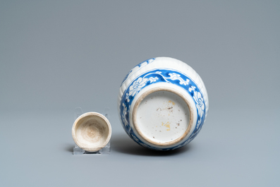A Chinese ribbed blue and white jar and cover, Kangxi