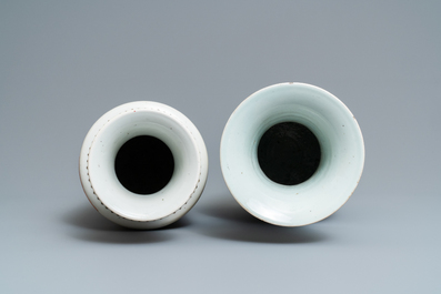 A Chinese famille verte rouleau vase and a famille rose vase, 19th C.