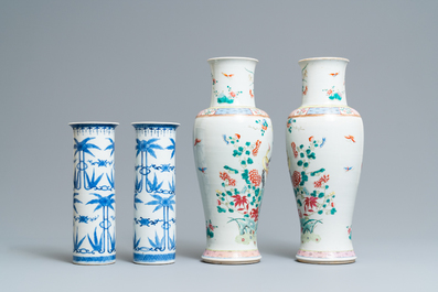 A pair of Chinese famille rose and a pair of blue and white vases, 19th C.