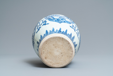 Een Chinese blauw-witte vaas met florale panelen, Kangxi