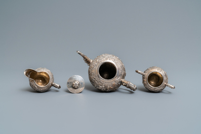 A Chinese silver teapot, cream jug and sugar jar, marked Luen Wo - Shanghai, late 19th C.