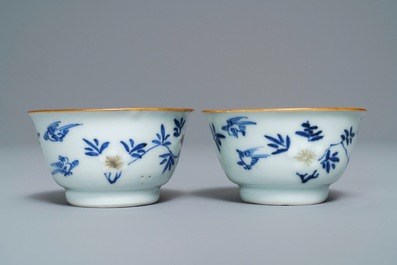 Six Chinese blue, white and copper-red cups and saucers, Kangxi