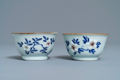 Six Chinese blue, white and copper-red cups and saucers, Kangxi