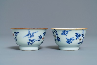 Six Chinese blue, white and copper-red cups and saucers, Kangxi