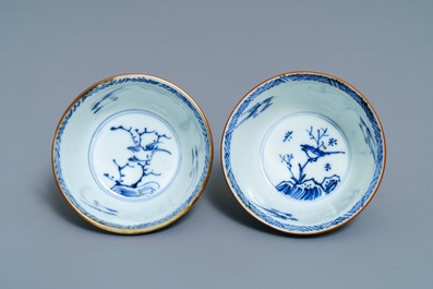 Six Chinese blue, white and copper-red cups and saucers, Kangxi