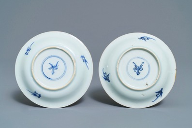 Six Chinese blue, white and copper-red cups and saucers, Kangxi