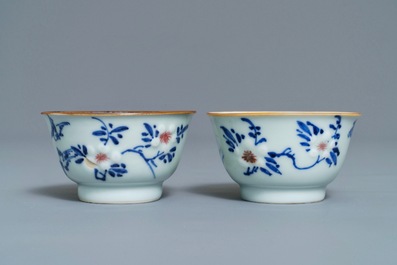 Six Chinese blue, white and copper-red cups and saucers, Kangxi