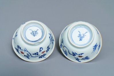 Six Chinese blue, white and copper-red cups and saucers, Kangxi