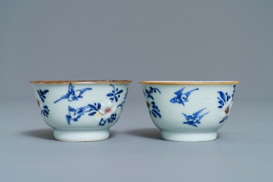 Six Chinese blue, white and copper-red cups and saucers, Kangxi