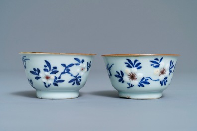 Six Chinese blue, white and copper-red cups and saucers, Kangxi