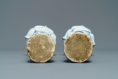 A Chinese blue and white five-piece 'landscape' garniture, Kangxi