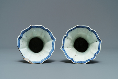A Chinese blue and white five-piece 'landscape' garniture, Kangxi