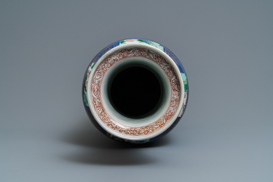 A massive Chinese famille verte on powder blue-ground rouleau vase, Kangxi