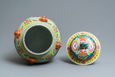 A pair of large Chinese famille rose vases and covers, 19th C.