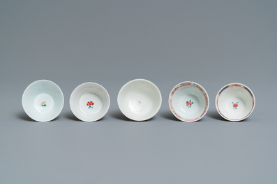 Five Chinese famille rose cups and saucers, Yongzheng/Qianlong