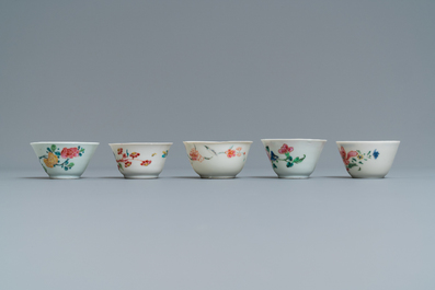 Five Chinese famille rose cups and saucers, Yongzheng/Qianlong