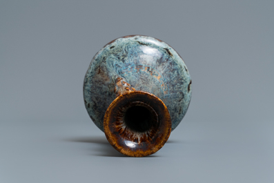 A Chinese flamb&eacute;-glazed vase with elephant head handles, 18/19th C.