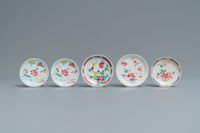 Five Chinese famille rose cups and saucers, Yongzheng/Qianlong