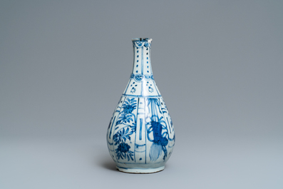 A Chinese blue and white kraak porcelain charger, a vase, a crow cup and a small plate, Wanli