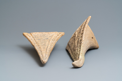 Two large triangular Thai Sawankhalok roof tile finials, 14/16th C.