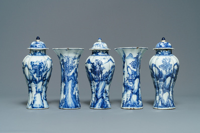 A Chinese blue and white five-piece 'landscape' garniture, Kangxi
