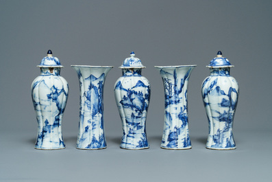 A Chinese blue and white five-piece 'landscape' garniture, Kangxi