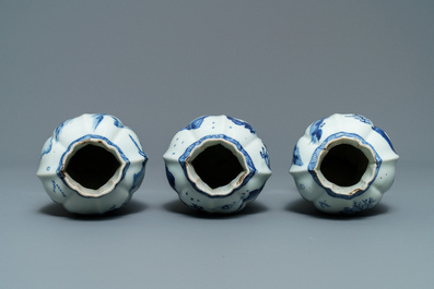 A Chinese blue and white five-piece 'landscape' garniture, Kangxi