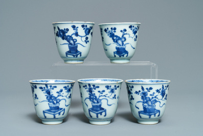 Eight Chinese blue and white cups and saucers, Kangxi