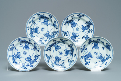 Eight Chinese blue and white cups and saucers, Kangxi