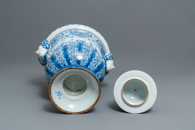 A massive Dutch Delft blue and white urn and cover, 19th C.