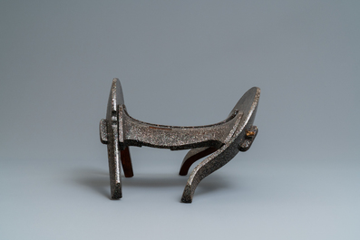 A Japanese aogai-nashiji 'kura' saddle with associated 'abumi' stirrups, Muromachi, 16th C.