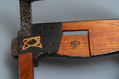 A Japanese aogai-nashiji 'kura' saddle with associated 'abumi' stirrups, Muromachi, 16th C.