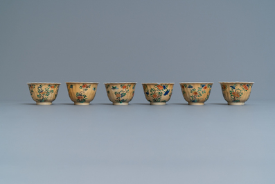 Eleven Chinese famille verte cups and saucers, Kangxi