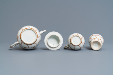 A Chinese iron-red and gilt 30-piece tea service with a butterfly, Qianlong