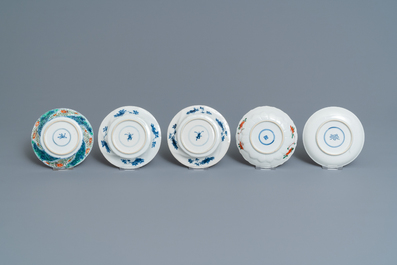 Eleven Chinese famille verte cups and saucers, Kangxi