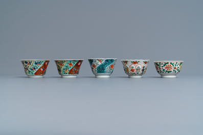 Eleven Chinese famille verte cups and saucers, Kangxi