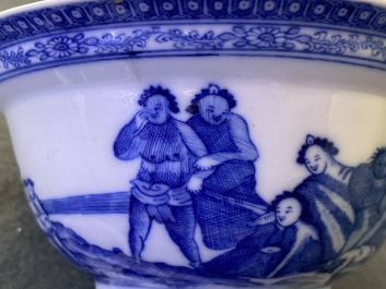 A Chinese blue and white bowl with an unusual scene with slaves, Qianlong