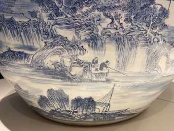 A large Chinese blue and white 'landscape' fish bowl, Qianlong