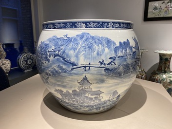 A large Chinese blue and white 'landscape' fish bowl, Qianlong