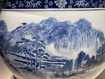 A large Chinese blue and white 'landscape' fish bowl, Qianlong