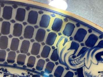 A Chinese blue and white dish after Cornelis Pronk: 'Dames au Parasol', Qianlong