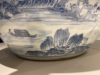 A large Chinese blue and white 'landscape' fish bowl, Qianlong