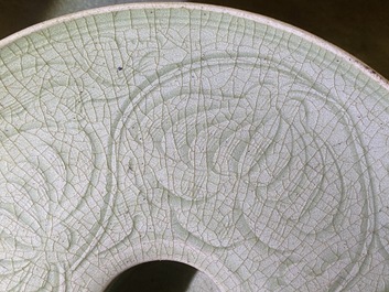 A Chinese Yaozhou celadon bowl with incised floral design, Song or later
