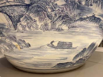 A large Chinese blue and white 'landscape' fish bowl, Qianlong