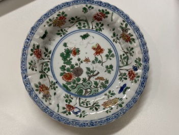 Eleven Chinese famille verte cups and saucers, Kangxi