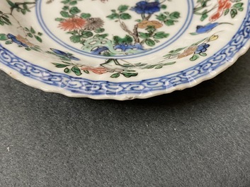 Eleven Chinese famille verte cups and saucers, Kangxi